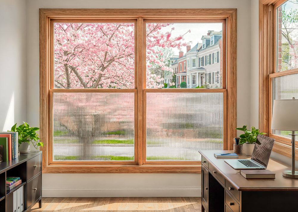 Manufacturer room example showing reeded film on the lower panes of home-office windows